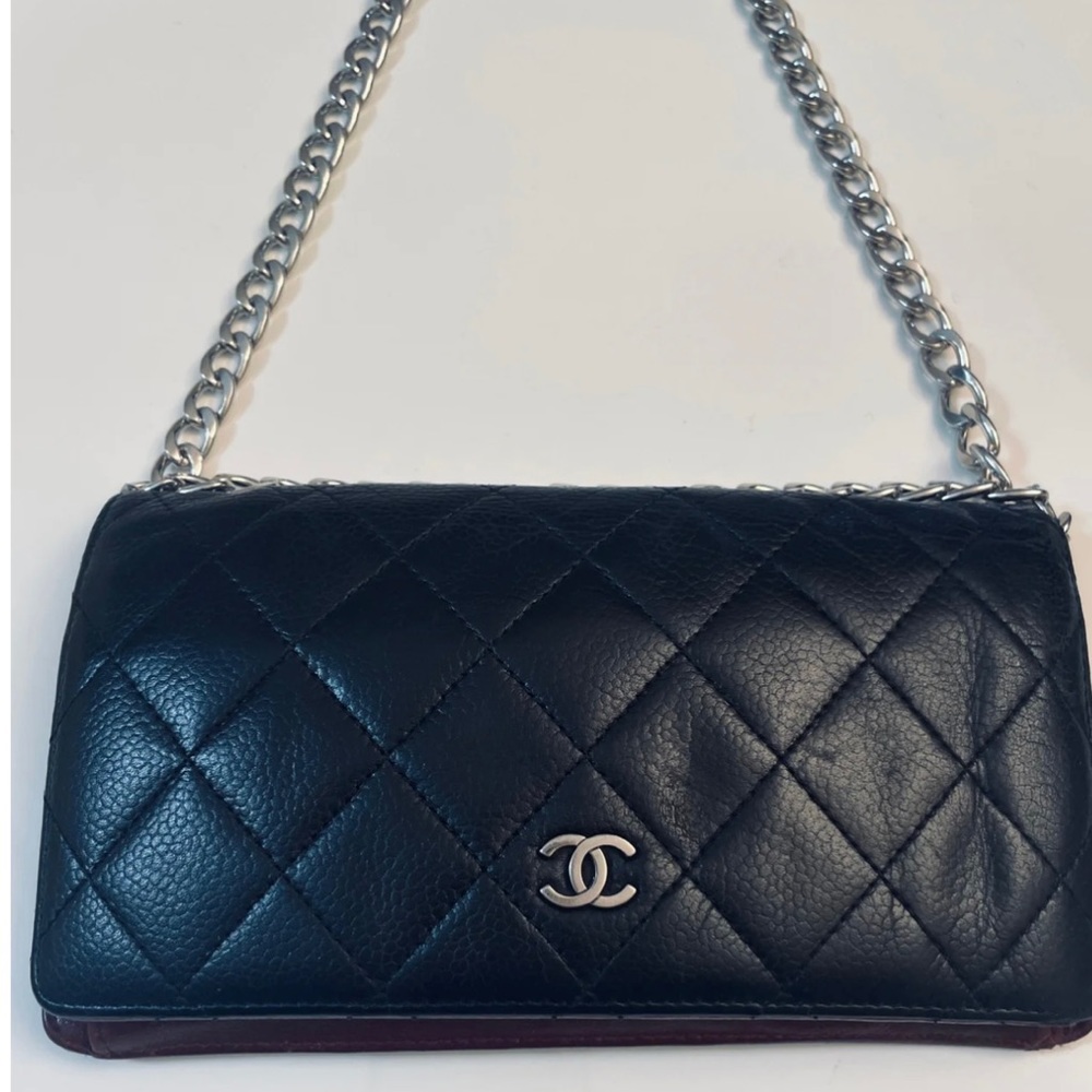 Authentic Chanel vintage wallet 
we’ve added the chain